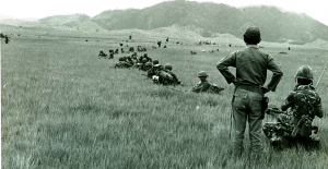 phou-keng-1970-under-attack-the-path-is-to-the-left-of-the-standing-guys-shoulder_resize